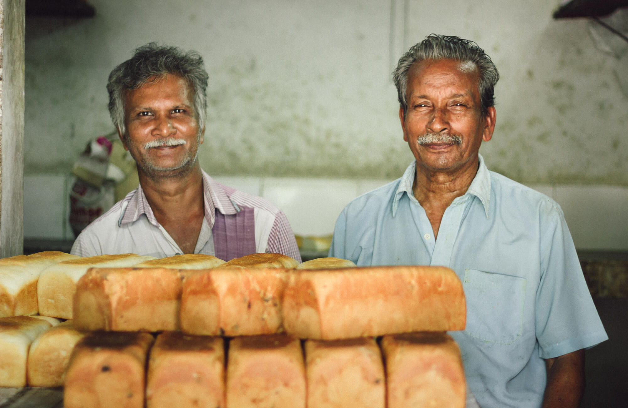 BREUDHER - THE STORY OF A DUTCH BREAD  -  Breudher makers at Quality Bakery seen with freshly baked loaves.