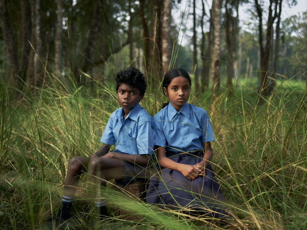 The Forest Gallery: Portrait of Unni and Aswathy, schoolchildren; Bijisha photographed at her family's well; Portrait of Swati.  
